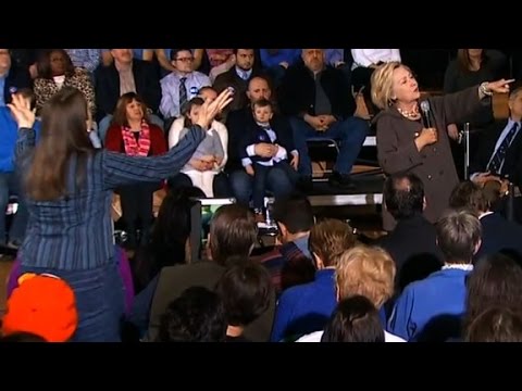 Lawmaker heckles Clinton over sex scandals