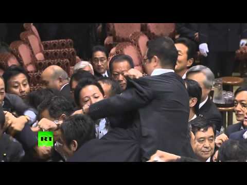 Scuffle in Japan upper house after panel approves military bills