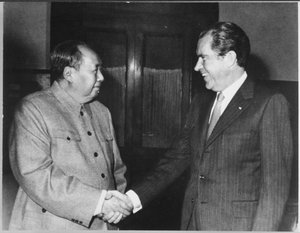 File - China's Communist Party Leader Mao Zedong (Tse-Tung) greets United States President Richard Nixon during his visit to China, 29 February, 1972.