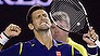 Novak Djokovic of Serbia celebrates after defeating Roger Federer of Switzerland in their semifinal match at the Australian Open tennis championships in Melbourne, Australia, Thursday, Jan. 28, 2016.(AP Photo/Aaron Favila)