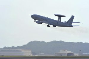 File - An E-3 Sentry airborne warning and control system (AWACS) from the 961st Airborne Air Control Squadron takes off from Kadena Air Base, Japan, Nov. 10, 2015.