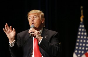 Republican presidential candidate Donald Trump speaks during a campaign event at the Orpheum Theatre in Sioux City, Iowa, Sunday, Jan. 31, 2016.