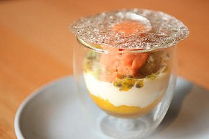 Verrine with guava sorbet, tropical fruit, whipped coconut cream and sugar 'glass'.