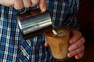 Sweet science: David Makin pours a latte.