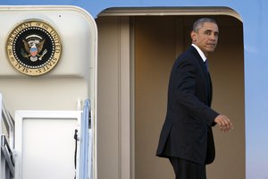 President Barack Obama boards Air Force One for a trip to Kenya and Ethiopia, on Thursday, July 23, 2015, at Andrews Air Force Base, Md. Obama is the first sitting U.S. president to visit both countries.