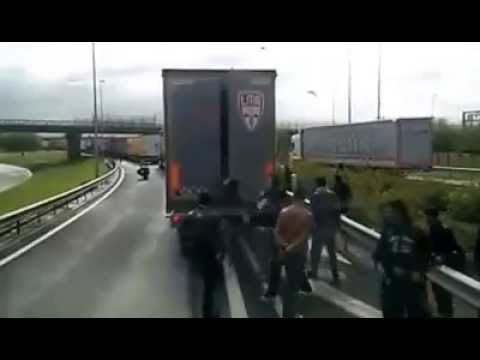 Illegal immigrants and truck drivers in Calais