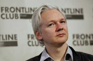 File - Julian Assange, founder of WikiLeaks listens at a press conference in London, Monday, Feb. 27, 2012.