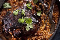 Greek tomato-baked lamb with orzo.