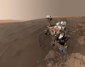 This self-portrait of NASA's Curiosity Mars rover shows the vehicle at "Namib Dune," where the rover's activities included scuffing into the dune with a wheel and scooping samples of sand for laboratory analysis.