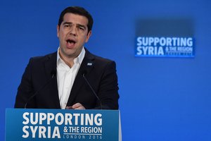 Greek Prime Minister Alexis Tsipras addresses delegates during the fourth 'Thermatic Pledging Session', in London, Thursday, Feb. 4, 2016, during the donor conference 'Supporting Syria & The Region'.