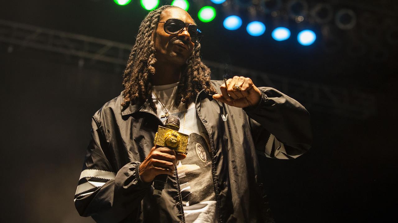 Snoop Dogg seen at Riot Fest and Carnival in Douglas Park on Sunday, Sept. 13, 2015 in Chicago. (Photo by Barry Brecheisen/Invision/AP)