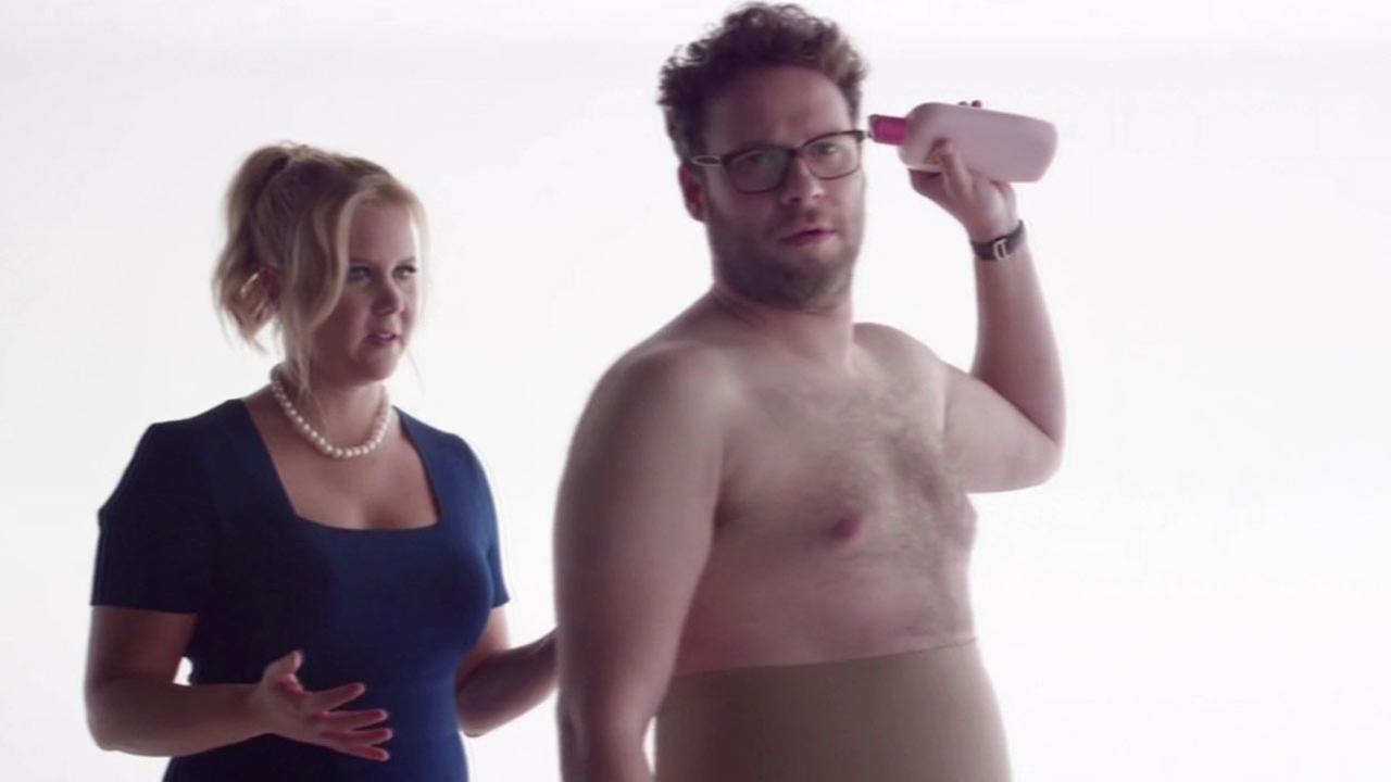 Amy Schumer and Seth Rogen in Bud Light Super Bowl commercial.