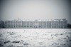 Over the banks of the Neva River stands the majestic Winter Palace in St Petersburg. Its opulence contrasts from the sharp edges of ice formed overnight during a harsh Russian winter's night. From its founding in the 1700s until the current day, this juxtaposition symbolises many episodes of St Petersburg's history.