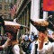 In a scene from the protests outside the 2000 Republican National Convention, activists march with animal masks in front of a line of mounted police. (Crashing The Party)