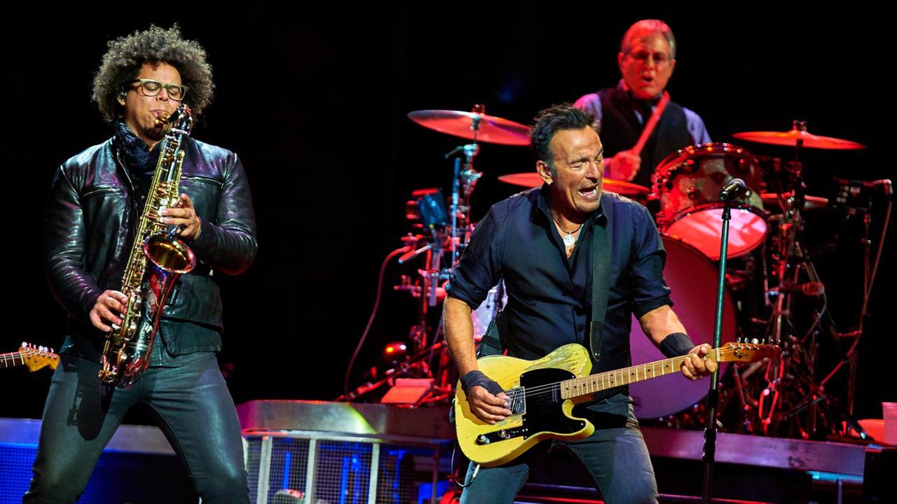 Bruce Springsteen, center, Max Weinberg, and Jake Clemons, left, perform with the E Street Band at Madison Square Garden, Wednesday, Jan. 27, 2016, in New York.