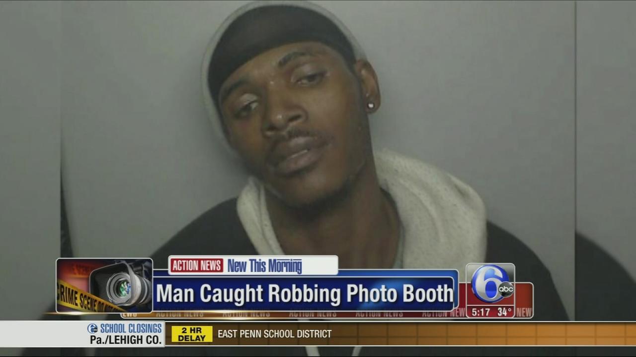 VIDEO: Man caught allegedly robbing photo booth