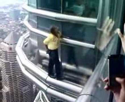 French Spiderman Scaling Petronas Twin Towers