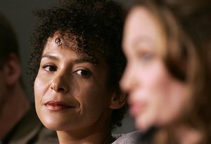  Mariane Pearl, French author and wife of slain journalist Daniel Pearl, left, listens to American actress Angelina Jolie, right, during a press conference for the film &quot;A Mighty Heart,&quot; at the 60th International film festival in Cannes, southern France.