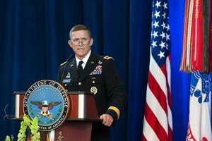 File - Army Lieutenant General Michael Flynn speaks at the Defense Intelligence Agency change of directorship at Joint Base Anacostia-Bolling, July 24, 2012.