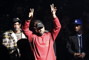 FILE - In this Feb. 11, 2016 file photo, Kanye West gestures to the audience at the unveiling of the Yeezy collection and album release for his latest album, "The Life of Pablo," at Madison Square Garden in New York.