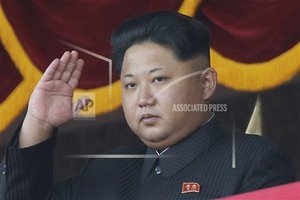 In this Oct. 10, 2015, file photo, North Korean leader Kim Jong Un gestures as he watches a military parade in Pyongyang, North Korea.