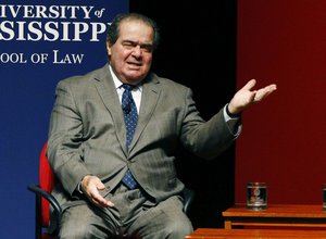 U.S. Supreme Court Justice Antonin Scalia jokes about his experiences as a law student at a program with fellow Justice Elena Kagan, Monday, Dec. 15, 2014 at the University of Mississippi in Oxford, Miss.