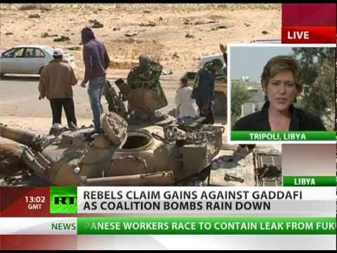 Libya rebels claim gains on Gaddafi, take back Ajdabiya as bombs rain down