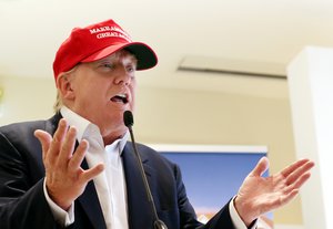 FILE - In this July 30, 2015 file photo, Republican presidential candidate Donald Trump speaks to the media during a news conference on the first day of the Women's British Open golf championship on the Turnberry golf course in Turnberry, Scotland.