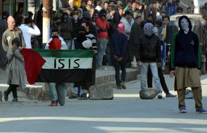 Kashmiri Muslim protesters hold pakistan and ISIS flags during a protest against Indian government in downtown area of Srinagar, the summer capital of Indian Kashmir, 05 February 2016. Police fired dozens of tear smoke canisters and rubber bullets to disperse the Kashmiri Muslim protesters who were protesting after the Friday congregation prayers outside Kashmir's main mosque, Jamia Masjid.