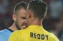 Flashpoint:  Matt Jurman of Sydney FC and Wanderers goalkeeper Liam Reddy share a moment of derby passion.