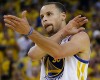 Golden State Warriors shooting guard Stephen Curry gestures against the Los Angeles Clippers during the first quarter of Game 6 of an opening-round NBA basketball playoff series in Oakland, Calif., Thursday, May 1, 2014.