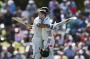 Century-makers: Steve Smith is congratulated by Joe Burns after reaching his ton at Hagley Oval. Burns made 170 in his ...