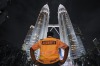 A security guard stands guard in front of Malaysia's iconic building, Petronas Twin Towers in Kuala Lumpur, Malaysia.