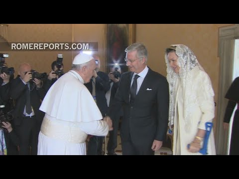 The Queen of Belgium, in white with crutches, visits Pope Francis