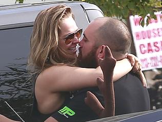 Ronda Rousey spotted kissing boyfriend, Travis Browne shortly after leaving their gym in Los Angeles.