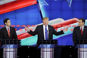 Republican presidential candidate, businessman Donald Trump, center, speaks as Republican presidential candidate, Sen. Marco Rubio, R-Fla., left, and Republican presidential candidate, Sen. Ted Cruz, R-Texas, right, look on during a Republican presidential primary debate at The University of Houston, Thursday, Feb. 25, 2016, in Houston.