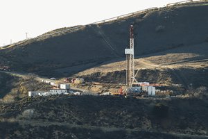 File - Equipment and machinery is seen on a ridge above a natural gas well known as SS25 in Southern California Gas Company's vast Aliso Canyon facility, 14 December, 2015. Pressure on the company has been mounting as residents of nearby Porter Ranch deal with the odor resulting from a leak at the well which was discovered on October 23.