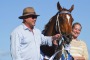 Trainer Peter Moody poses with Flamberge after his surprise win in the Oakleigh Plate at Caulfield on Saturday.