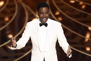 Host Chris Rock speaks at the Oscars on Sunday, Feb. 28, 2016, at the Dolby Theatre in Los Angeles.