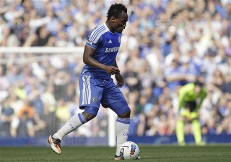 Chelsea's Michael Essien plays against Tottenham Hotspur during their English Premier League soccer match at Stamford Bridge, London, Saturday, March 24, 2012.