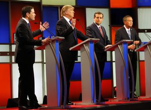 Republican presidential candidates, Sen. Marco Rubio, R-Fla., and businessman Donald Trump argue as Sen. Ted Cruz, R-Texas, and Ohio Gov. John Kasich listen during a Republican presidential primary debate at Fox Theatre, Thursday, March 3, 2016, in Detroit.