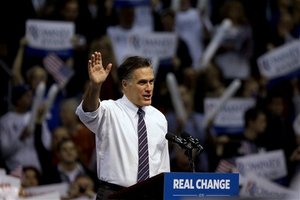 Republican presidential candidate, former Massachusetts Gov. Mitt Romney waves to the crowd as he speaks at a campaign event at the Verizon Wireless Arena