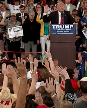 Donald Trump asks supporters to pledge their allegiance to him during a rally in Florida.