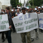 Activists in Palestine calling for CRH to end its complicity with the construction of Israel's Wall and settlements