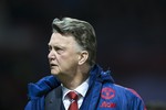 Manchester United's manager Louis van Gaal takes to the touchline before the English Premier League soccer match between Manchester United and Stoke at Old Trafford Stadium, Manchester, England, Tuesday, Feb. 2, 2016.