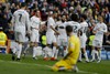 Real Madrid's Karim Benzema, third left, celebrates with teammates ( Marcelo , Cristiano Ronaldo , Gareth Bale ) after scoring a goal against Sporting Gijon during the Spanish La Liga soccer match between Real Madrid and Sporting Gijon