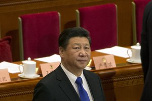 Chinese President Xi Jinping, attends the opening session of the Chinese People's Political Consultative Conference (CPPCC) in Beijing's Great Hall of the People, Thursday, March 3, 2016. The more than 2,000 members of China's top legislative advisory body convened their annual meeting Thursday, kicking off a political high season that will continue with the opening of the national congress on Saturday. (AP Photo/Ng Han Guan)