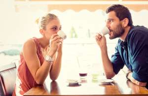 Young couple drinking coffee.