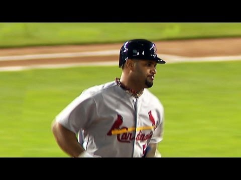 Pujols hits a trio of homers in World Series