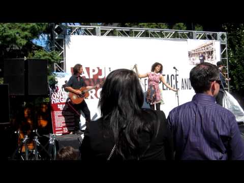 Régine Chassagne, Eddie Vedder and Owen Pallett Performing "Haiti" for APJ